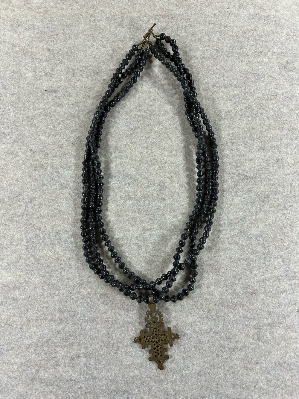 Akola Black Beaded Necklace with Cross Pendant